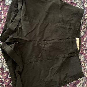 Black shorts. Material is like work pants.